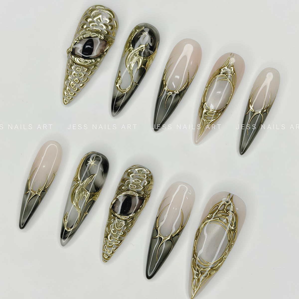 Draconic - Handcrafted 3D Gold Dragon Eye and Metallic Chrome Press-On Nail Set Displayed at a Flat Lay Angle