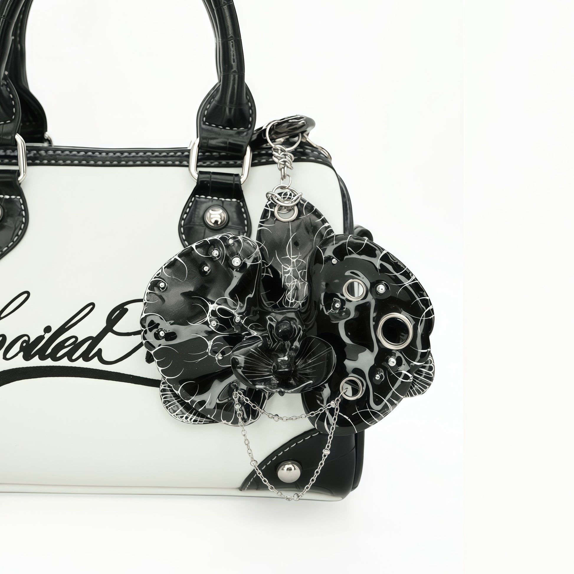 Orchid.exe - Avant-Garde Black Orchid Statement Bag Charm Featuring Draped Silver Chains and Piercing Rings