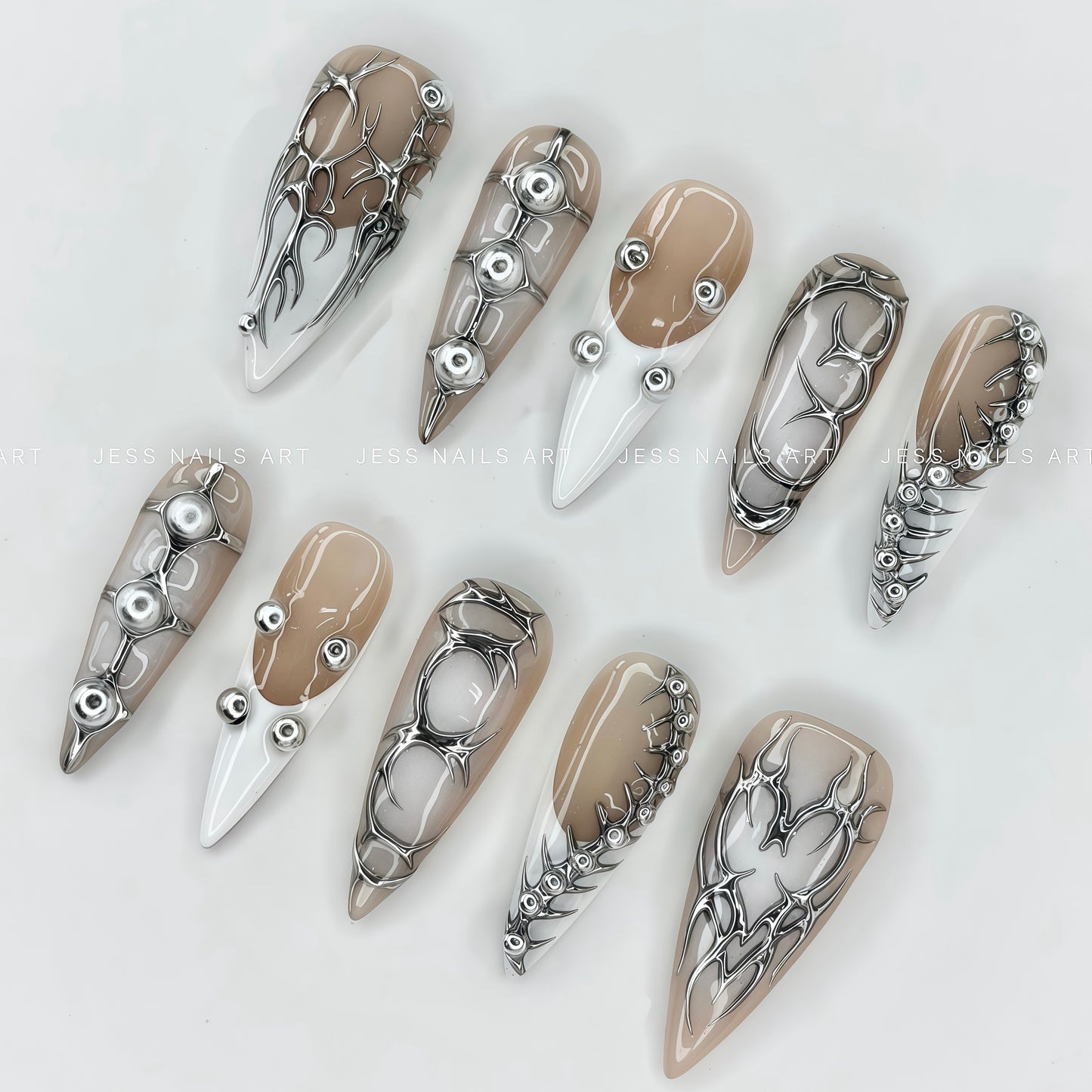Nude System - Subversive Cyberpunk Handcrafted Press-On Nails Set Featuring Silver Metal Accents and French Tip Art