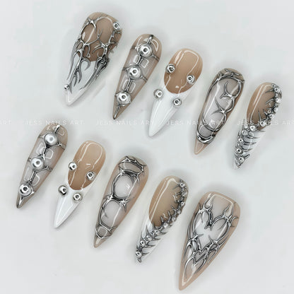 Nude System - Subversive Cyberpunk Handcrafted Press-On Nails Set Featuring Silver Metal Accents and French Tip Art