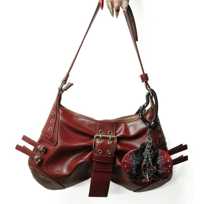 Red Voltage - High-Fashion Handcrafted Sculpted Orchid Charm Showcased on a Designer Shoulder Bag