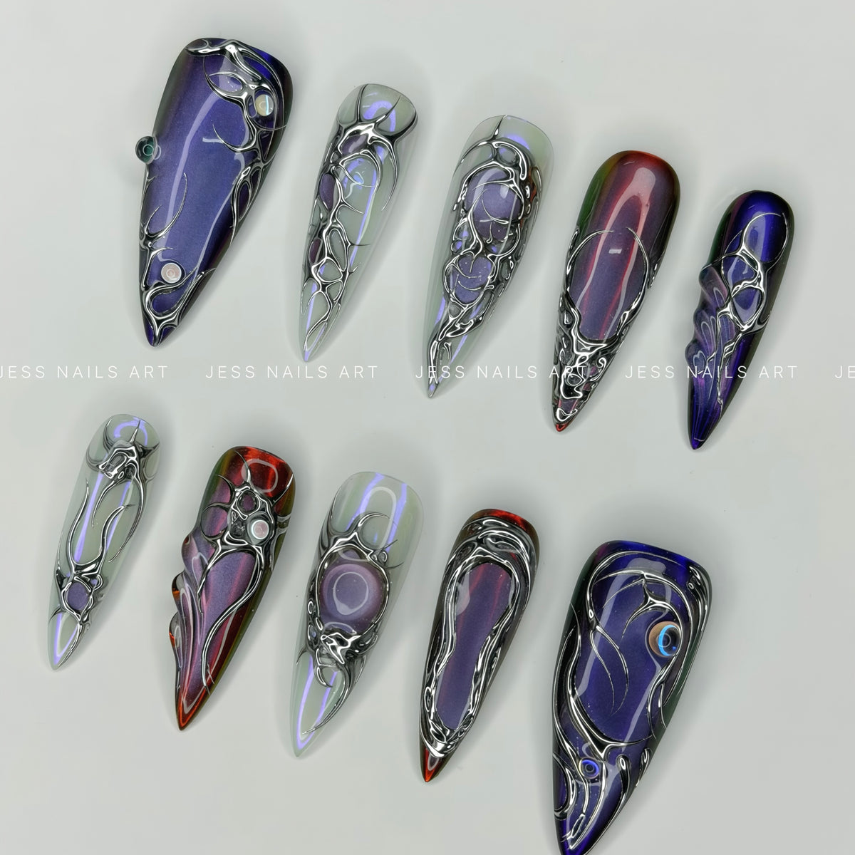 New Era - Handcrafted Cyberpunk Multicoloured Cat-Eye and Liquid Silver Chrome Press-On Nail Set Displayed at an Angle
