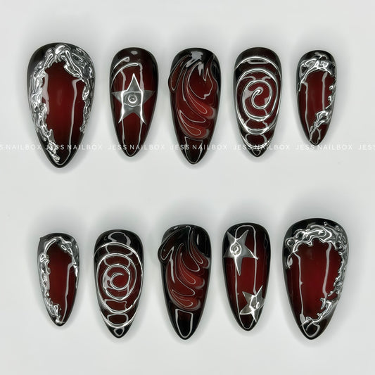 Crimson Vibe dark Y2K press-on nails featuring blood red burgundy gradient and molten silver liquid metal edges.