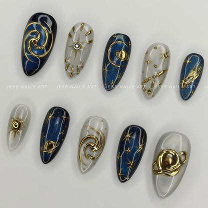 Cosmic Black Hole - Handcrafted Cosmic Galaxy Press-On Nail Set Displayed at an Angle Showing 3D Gold Chrome Planets and Constellations