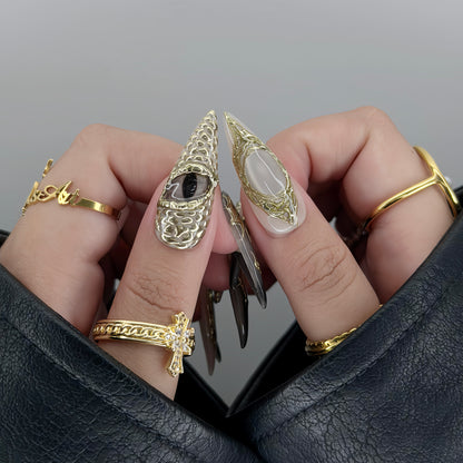 Draconic - Close-Up Shot of 3D Gold Chrome Dragon Eye Thumb Nail and Intricate Tribal Gold Line Work