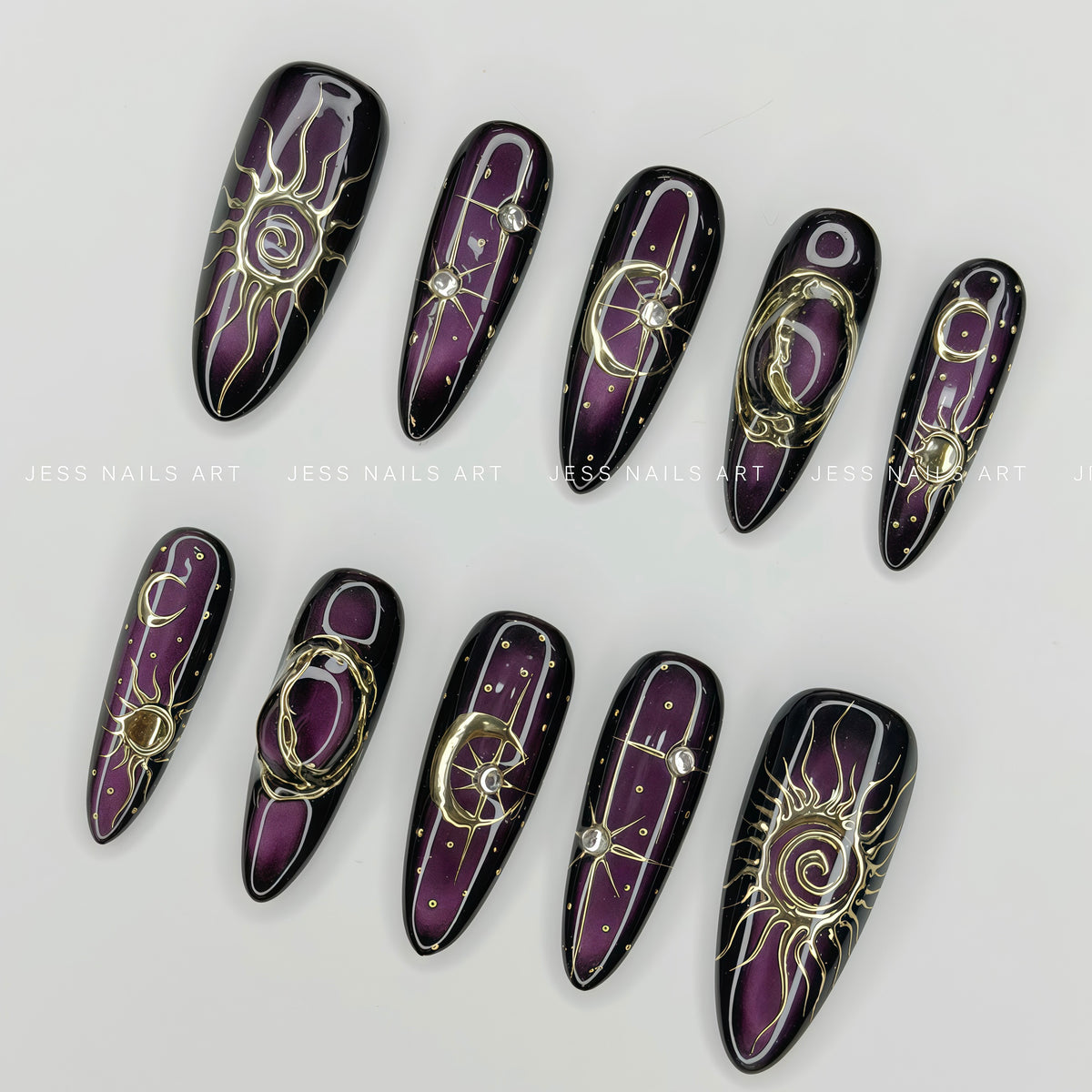 Night Sky - Handcrafted Mystic Purple and Gold Celestial Press-On Nail Set Displayed at an Angle Showing Intricate Foil Details