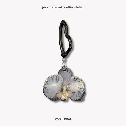 Cyber Petal - Handcrafted Pearlescent White Resin Orchid Bag Charm with 3D Silver Cyber Chrome Linework and Pearls