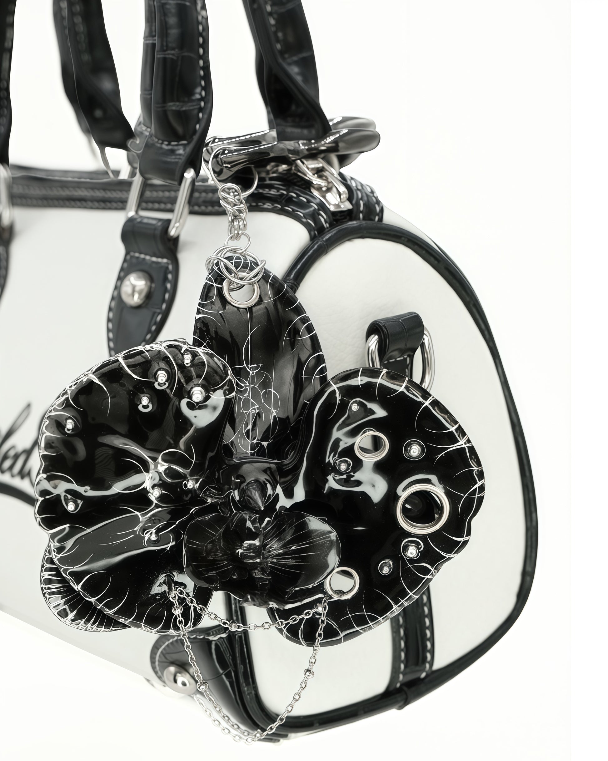 Orchid.exe - High-Fashion Handcrafted Black Resin Orchid Charm Styled on a Leather Bowler Bag